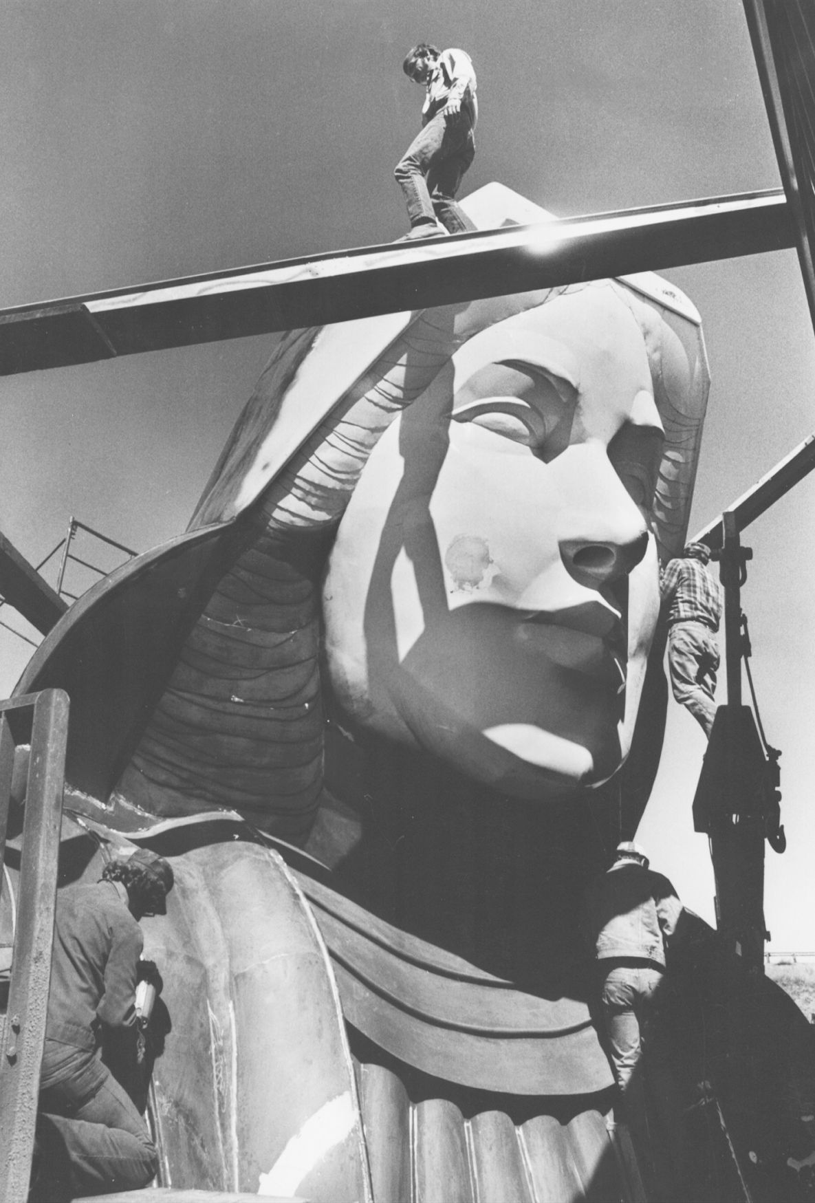 Working on the statue
